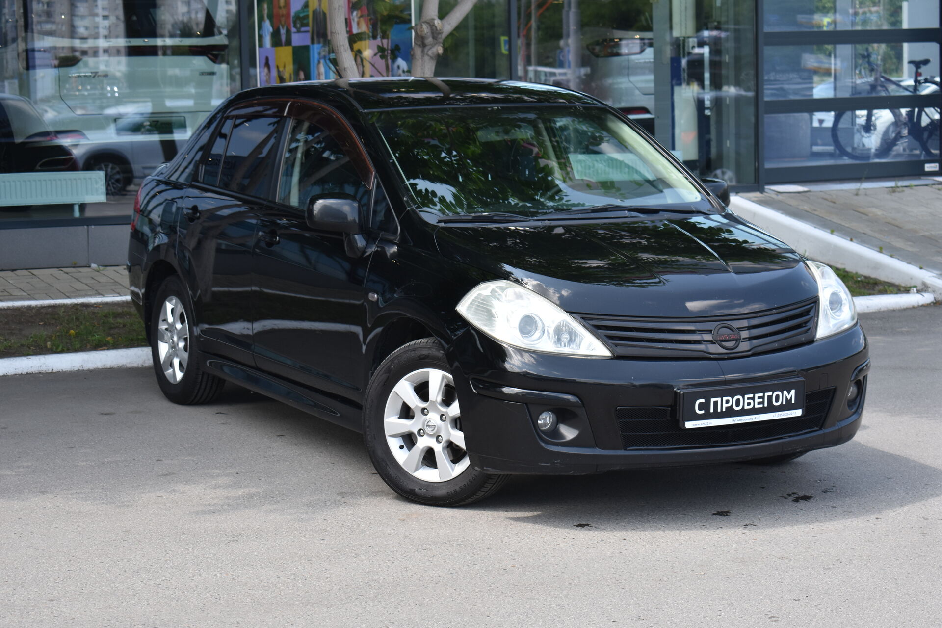 Nissan Tiida, I Рестайлинг 1.6 MT (110 л.с.) 2011