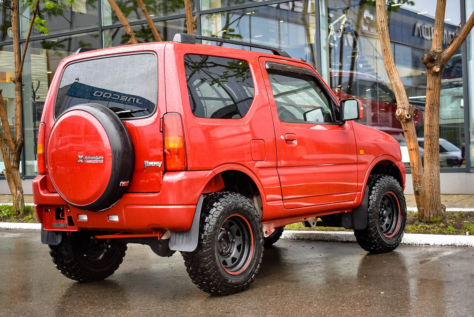 Suzuki Jimny, III Рестайлинг 2 Kei car 0.7 AT (64 л.с.) 4WD 2012