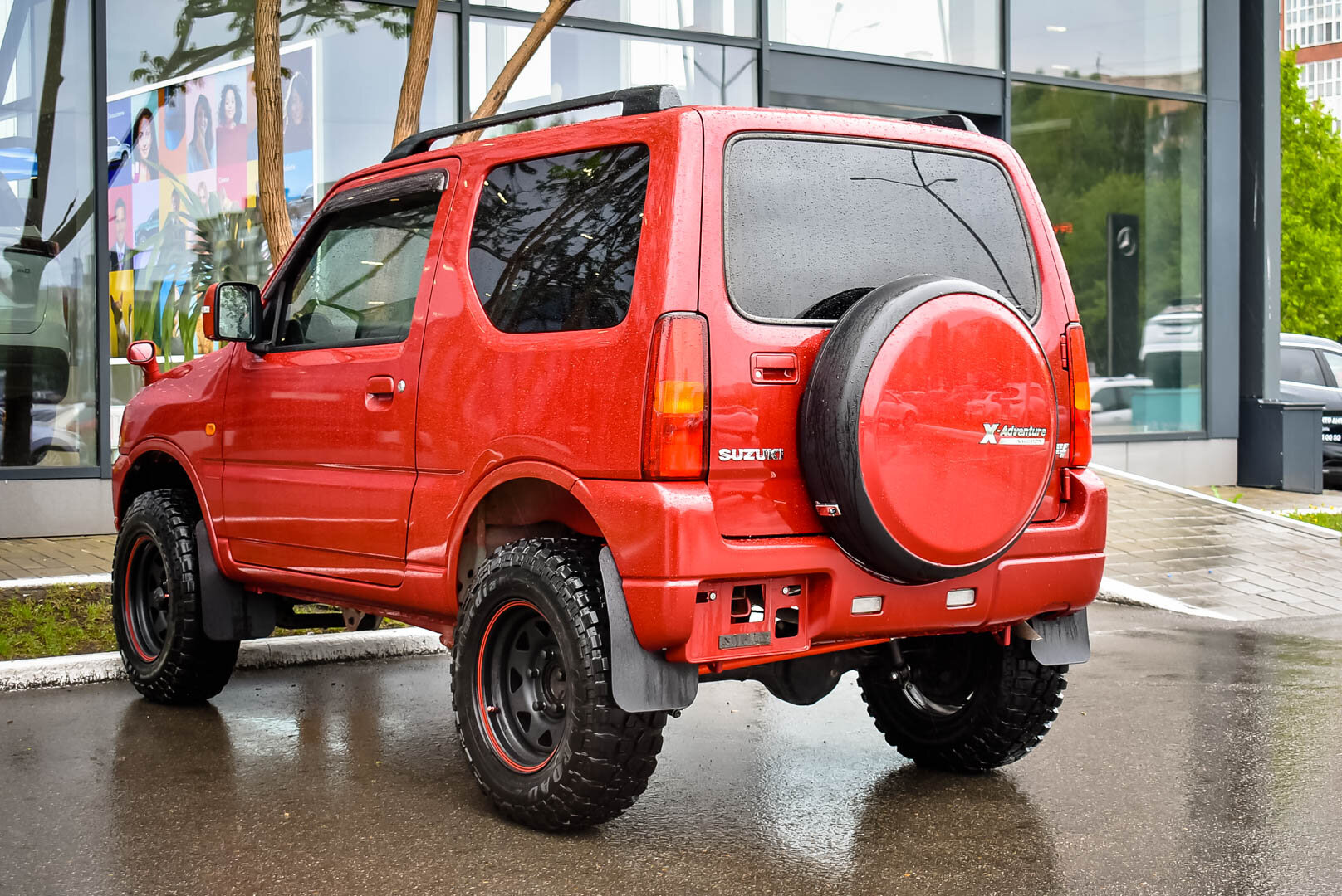 Suzuki Jimny, III Рестайлинг 2 Kei car 0.7 AT (64 л.с.) 4WD 2012