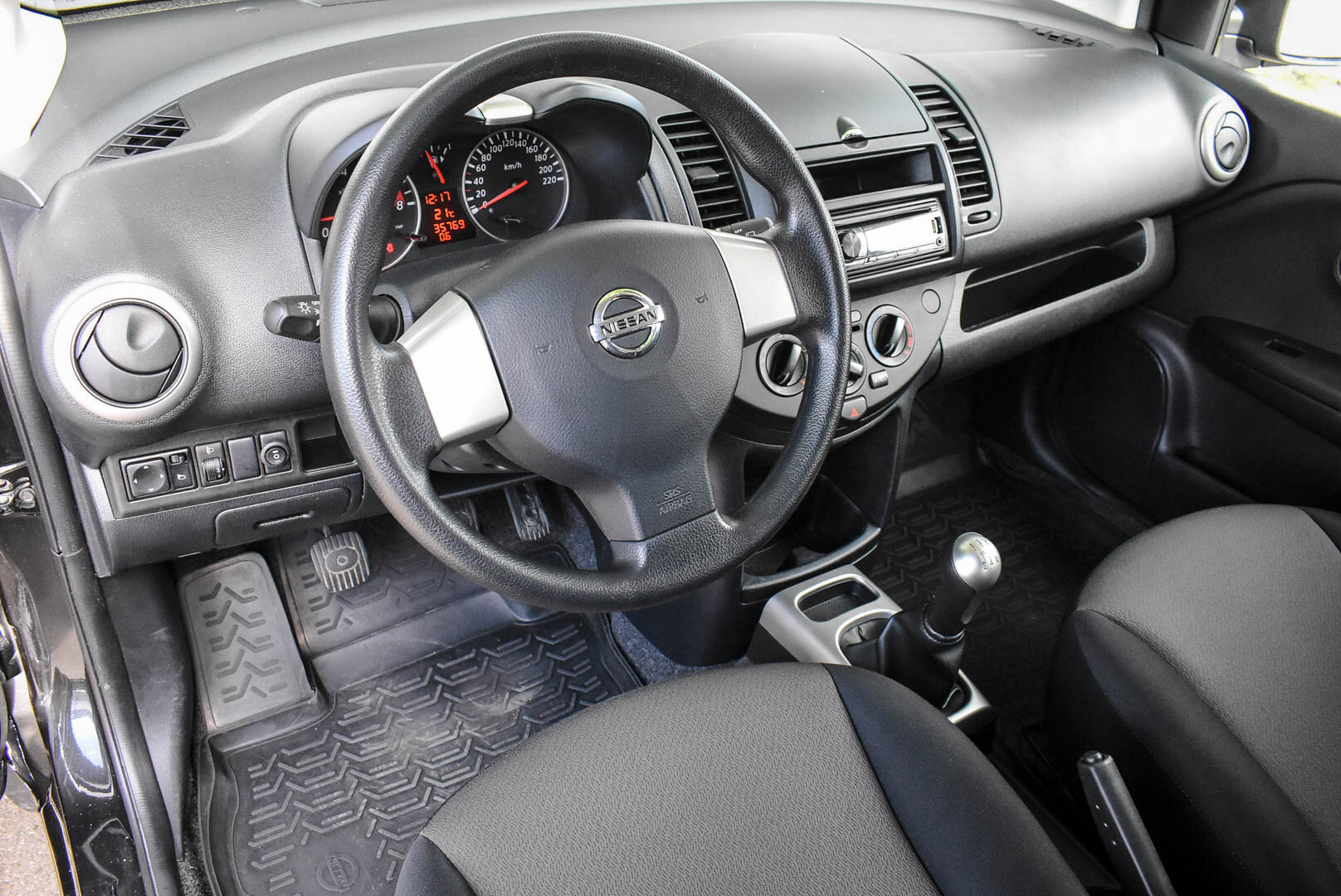 Nissan Note, I Рестайлинг 1.4 MT (88 л.с.) 2013