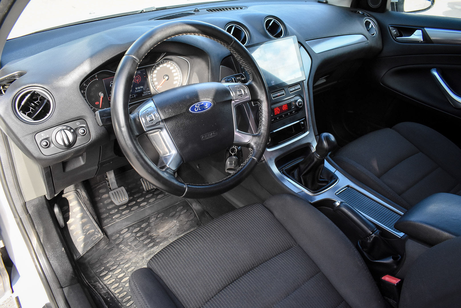Ford Mondeo, IV Рестайлинг 2.0 MT (145 л.с.) 2012